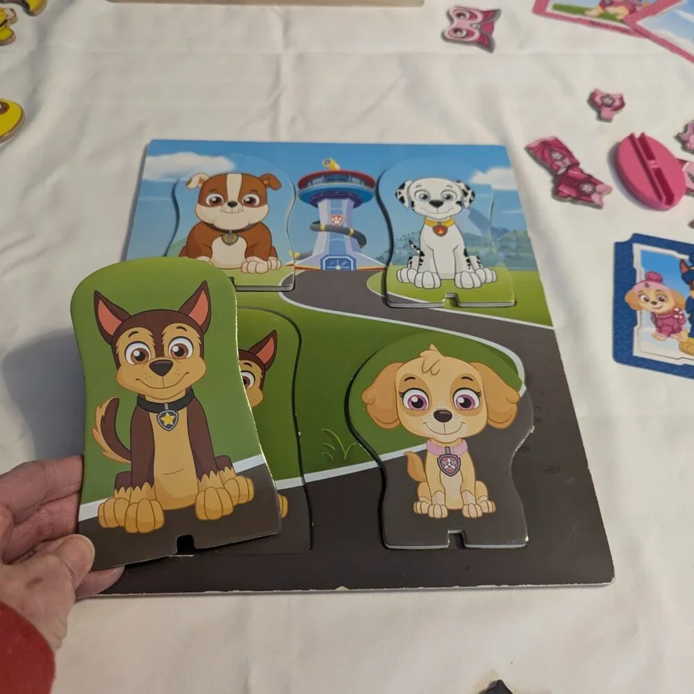 Paw Patrol Puzzle, by Melissa & Doug, and a plush Chase